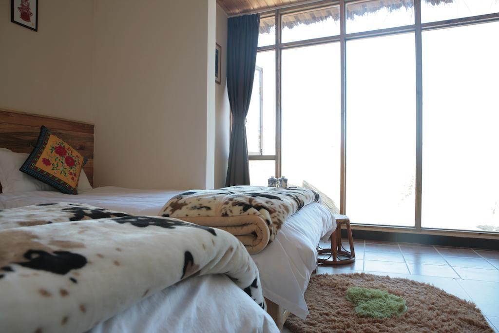 Flowers Residence Yuanyang  Rum bild