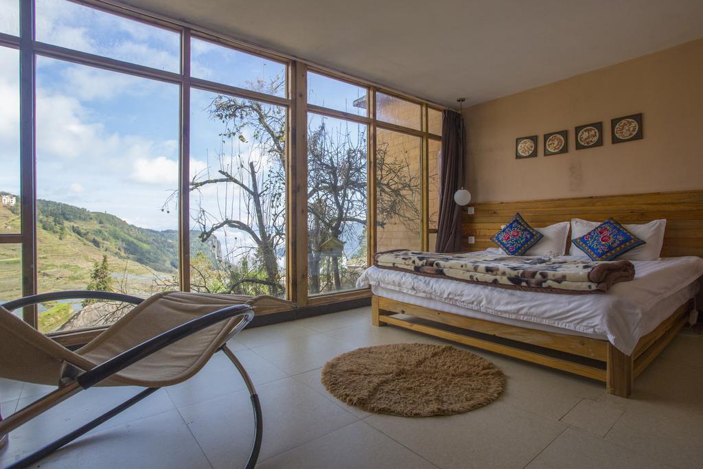 Flowers Residence Yuanyang  Rum bild